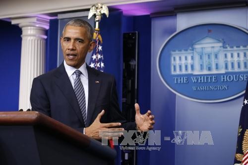 Obama appelle Trump à «tendre la main» aux Américains inquiets - ảnh 1